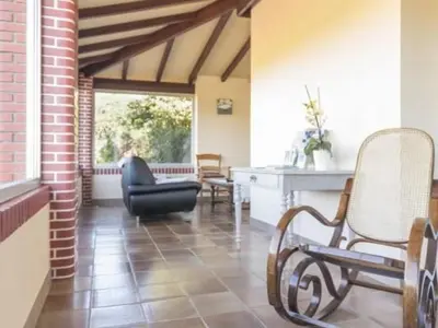 Coin salon dans l'établissement Gîte calme sur domaine viticole, cheminée, wifi, équipements bébé, proche Nantes - FR-1-306-794