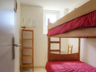 Un ou plusieurs lits dans un hébergement de l'établissement Gîte en Bord de Mer à Saint-Michel-Chef-Chef - Terrasse, Parking, Équipements Familiaux - FR-1-306-819