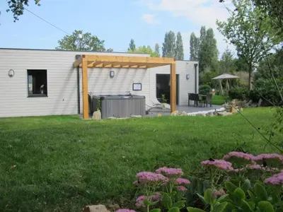 Jardin de l'établissement Gîte tout confort avec spa et jardin clos près de Nantes - FR-1-306-849