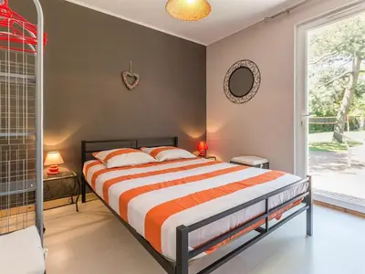 Un ou plusieurs lits dans un hébergement de l'établissement Maison calme de campagne avec jardin clos, jeux pour enfants et vélos à proximité de Châteaubriant - FR-1-306-902