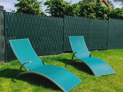 Jardin de l'établissement Gîte au calme avec jardin privé, vélos gratuits, équipements bébé et garage - proche de Nantes et plages - FR-1-306-980