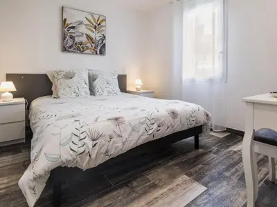 Un ou plusieurs lits dans un hébergement de l'établissement Gîte au calme avec jardin privé, vélos gratuits, équipements bébé et garage - proche de Nantes et plages - FR-1-306-980