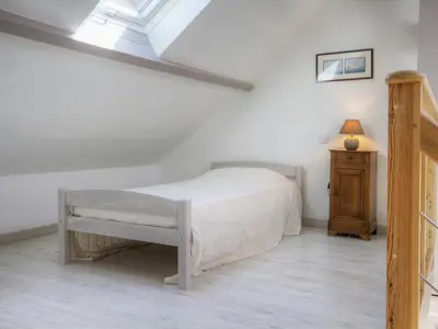 Un ou plusieurs lits dans un hébergement de l'établissement Charmant gîte face mer avec balcon privé, proche Pornic, tout confort assuré - FR-1-306-1025