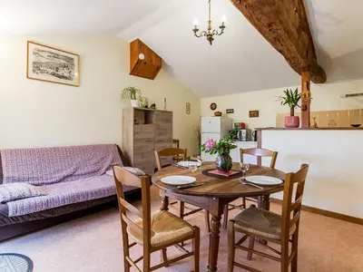 Coin salon dans l'établissement Gîte rénové à Corcoué-sur-Logne avec étang privé et équipements bébé - FR-1-306-1066