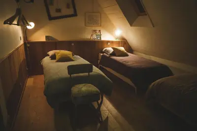 Un ou plusieurs lits dans un hébergement de l'établissement Chambres d'hôtes de charme - Gîtes cosy - LA CLE DES CHAMPS - A la campagne