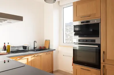 Cuisine ou kitchenette dans l'établissement Cœur de ville, tout équipé, local vélos