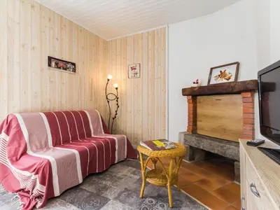 Télévision ou salle de divertissement dans l'établissement Gîte champêtre rénové avec terrasse & équipements, proche Pornic - animaux acceptés - FR-1-306-1027