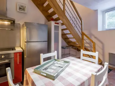 Cuisine ou kitchenette dans l'établissement Gîte cosy aux portes de Nantes, terrasse privée, vélos, Wifi, draps inclus - FR-1-306-824