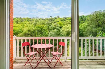 Balcon ou terrasse dans l'établissement Le Moulin de Pilet