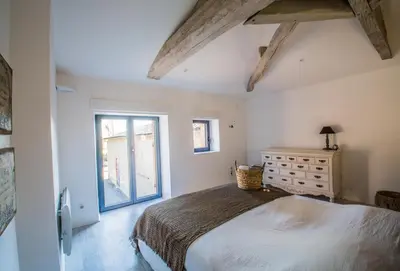 Un ou plusieurs lits dans un hébergement de l'établissement La grange du cleray