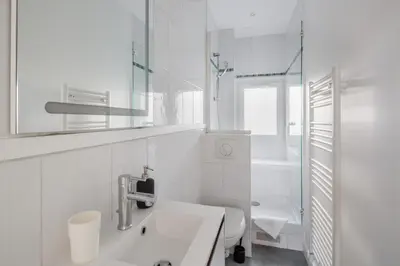 Salle de bains dans l'établissement Le Pommeraye - Coeur de ville
