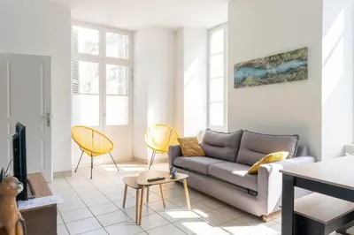 Coin salon dans l'établissement nid douillet 4places 2lits cœur de ville logement Hote-Zen wifi