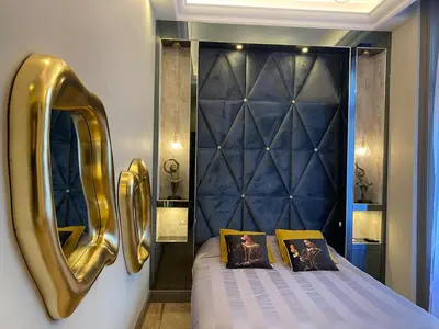 Un ou plusieurs lits dans un hébergement de l'établissement OLuxuxy49 - Appartements T3 de prestige, Place du Ralliement, 2ème 3ème et 4ème étage SANS ASCENSEUR