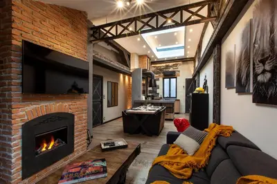 Coin salon dans l'établissement OLuxuxy49 - Appartements T3 de prestige, Place du Ralliement, 2ème 3ème et 4ème étage SANS ASCENSEUR