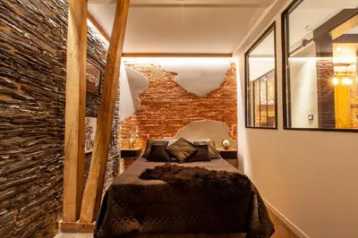Un ou plusieurs lits dans un hébergement de l'établissement OLuxuxy49 - Appartements T3 de prestige, Place du Ralliement, 2ème 3ème et 4ème étage SANS ASCENSEUR