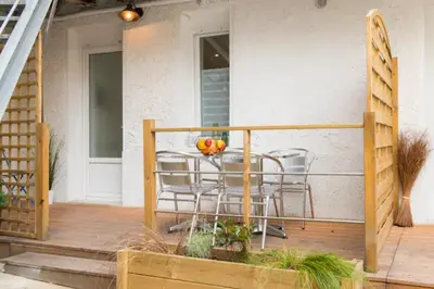 Balcon ou terrasse dans l'établissement Gîte urbain ancienne écurie au centre ville et PARKING