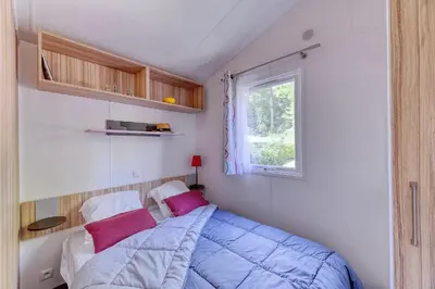 Un ou plusieurs lits dans un hébergement de l'établissement Nantes Camping Le Petit Port