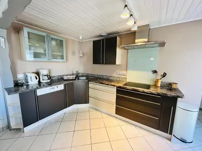 Cuisine ou kitchenette dans l'établissement Maison familiale du Devallon