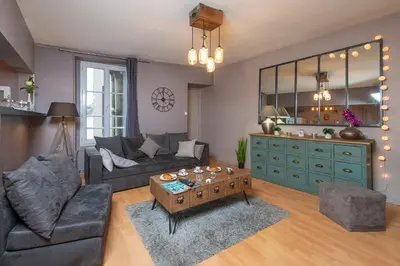 Coin salon dans l'établissement Appartement calme et cosy, Place du Ralliement