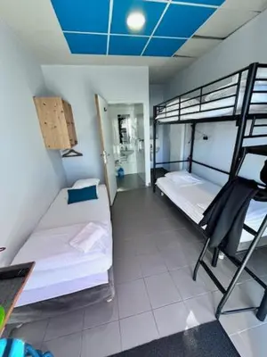 Un ou plusieurs lits dans un hébergement de l'établissement HOSTEL Les Bois Verts - Les Herbiers