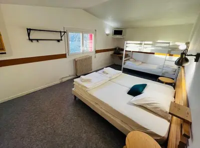 Un ou plusieurs lits dans un hébergement de l'établissement HOSTEL Les Bois Verts - Les Herbiers
