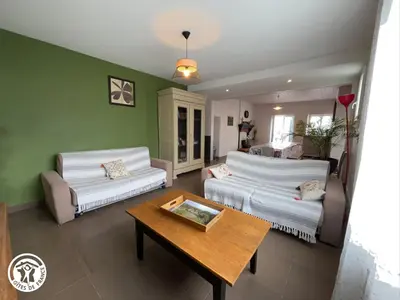 Un ou plusieurs lits dans un hébergement de l'établissement Gîte accessible PMR avec jardin clos, terrasses et proche Vélo Rail à Commequiers - FR-1-426-465