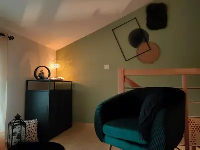 Coin salon dans l'établissement Echappée romantique