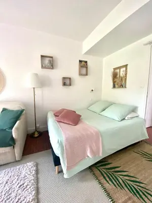 Un ou plusieurs lits dans un hébergement de l'établissement Cottage au sein du 