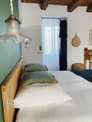Un ou plusieurs lits dans un hébergement de l'établissement Le Mottay Guesthouse