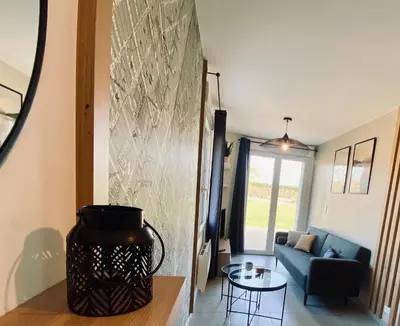 Coin salon dans l'établissement Maison en pierres au calme près d'Ancenis