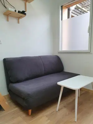 Coin salon dans l'établissement Angers Green Lodge - Cosy Studio