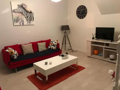 Télévision ou salle de divertissement dans l'établissement Le Clos D'isabeau
