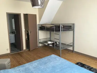 Un ou plusieurs lits dans un hébergement de l'établissement Le Clos D'isabeau