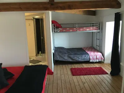Un ou plusieurs lits dans un hébergement de l'établissement Le Clos D'isabeau