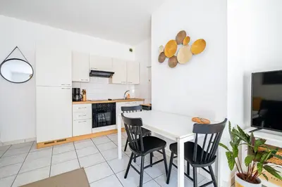 Cuisine ou kitchenette dans l'établissement T2 au calme - Rond Point de Vannes