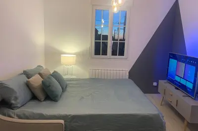 Un ou plusieurs lits dans un hébergement de l'établissement Studio cosy refait à neuf,au calme 5 min du centre