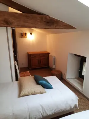 Un ou plusieurs lits dans un hébergement de l'établissement Gîte du Petit Moulin