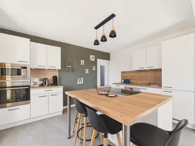 Cuisine ou kitchenette dans l'établissement Maison de vacances à Saint Hilaire de Riez