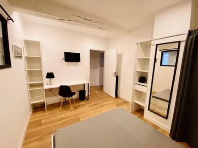 Télévision ou salle de divertissement dans l'établissement Appartement 97 M2 proche Puy du fou