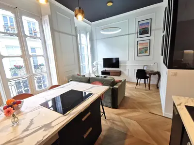 Télévision ou salle de divertissement dans l'établissement Nid urbain - L'Etoile du Sud - Hyper centre