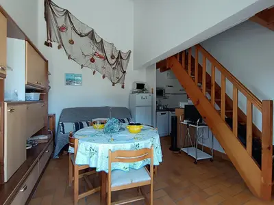 Cuisine ou kitchenette dans l'établissement Maison de vacances à 50m de la mer - 4 personnes - FR-1-364-104
