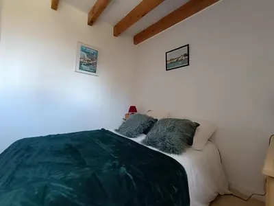 Un ou plusieurs lits dans un hébergement de l'établissement Maison de vacances à 50m de la mer - 4 personnes - FR-1-364-104