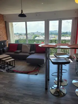 Coin salon dans l'établissement Grand T5 pour 7 Pers
