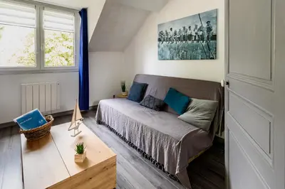 Un ou plusieurs lits dans un hébergement de l'établissement Villa de la plage