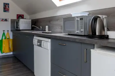 Cuisine ou kitchenette dans l'établissement Villa de la plage