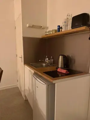 Cuisine ou kitchenette dans l'établissement LE DUPE