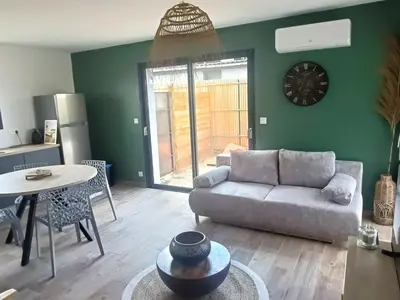 Coin salon dans l'établissement Apb Spa locations avec jacuzzi privatif