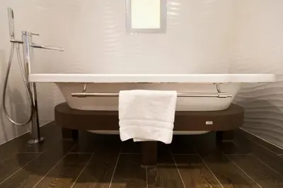 Salle de bains dans l'établissement HÔTEL LES PALIS