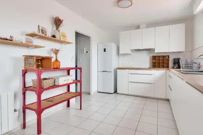 Cuisine ou kitchenette dans l'établissement Appart pour 6 adultes et 2 enfants avec terrasse