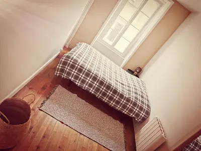 Un ou plusieurs lits dans un hébergement de l'établissement Appartement INDÉPENDANT centre ville 1chambre